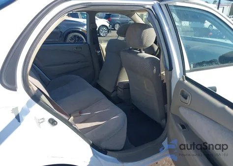 1999 Toyota Corolla Ce z USA, uszkodzony, nr VIN 1NXBR12E2XZ164958